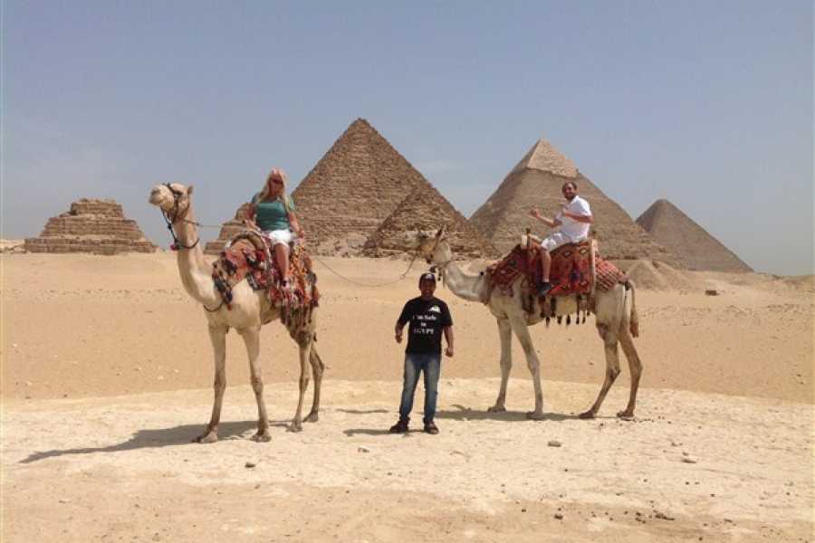 Camel Ride at Giza Pyramids During Sunrise or Sunset